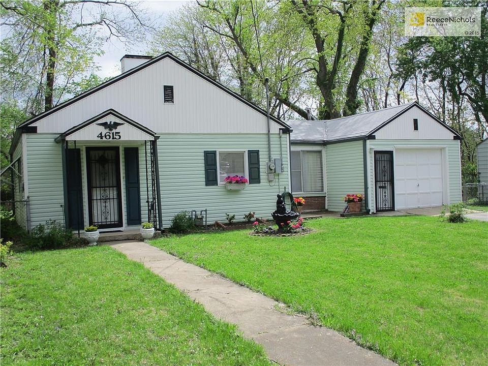Home features vinyl siding and a one-car, attached garage.