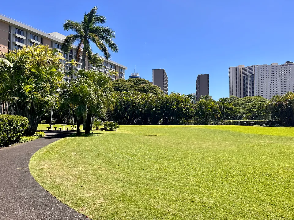 Enjoy the beautifully maintained lawns and open green spaces throughout Queen Emma Gardens.
