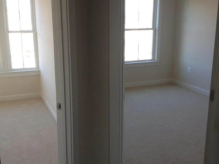Two standard bedroom entries from hallway