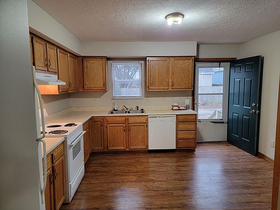 Kitchen with rear entrance to private off-street parking