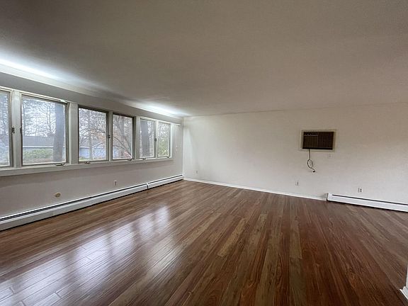 Bright living room with wall of windows