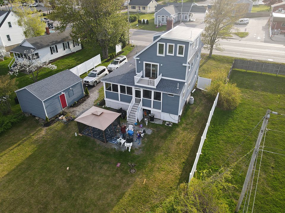 A beautiful coastal place to call Home.
View shows larege yard and outddoor rec- area complete with covered gazebo