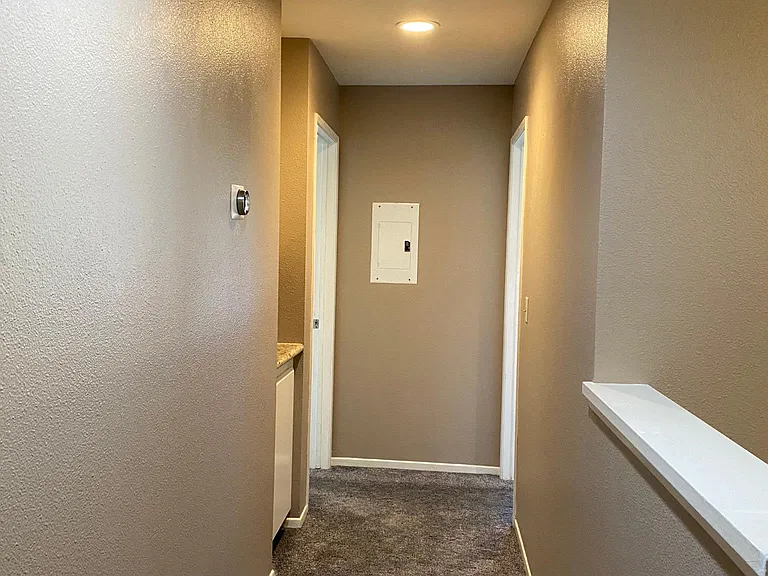 Upstairs hall provides nice separation from ground floor rooms and additional linen storage