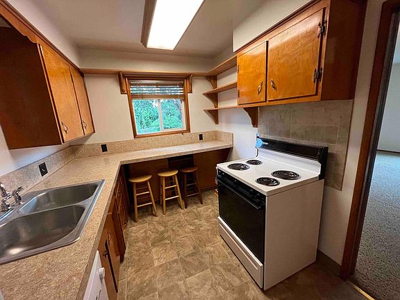 Kitchen with dishwasher and lots of counterspace.