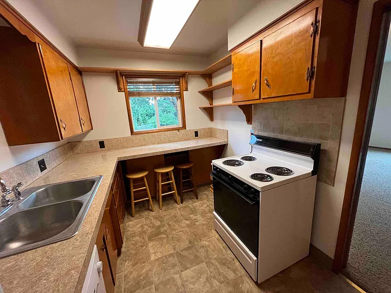 Kitchen with dishwasher and lots of counterspace.