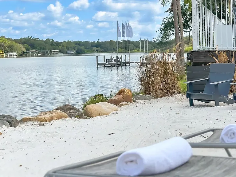 Enjoy serene moments by the river at our private beach!