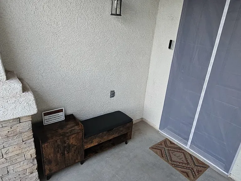 Main Entry Door. Indoor slippers provided in shoe-rack.