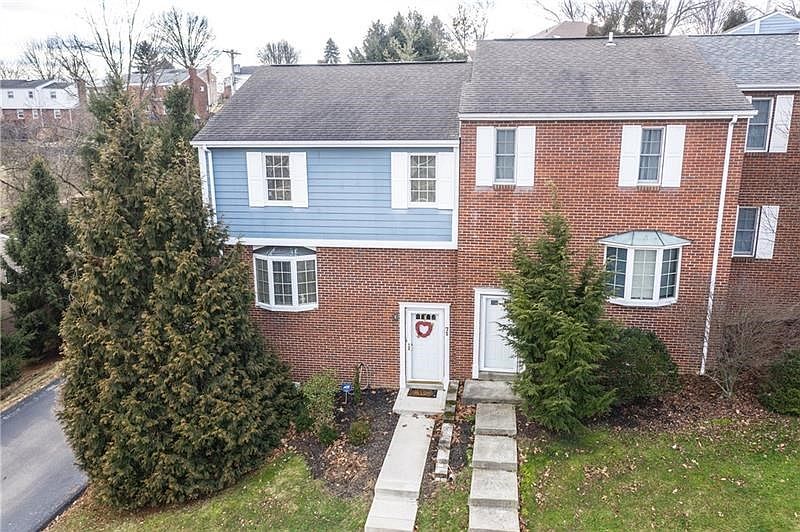 End unit 3 Bedrooms. 2 full plus 1/2 bath. All sidewalks and steps leading to entry have been redone.