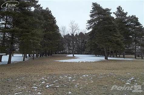 Beautiful property with tree-lined back yard.