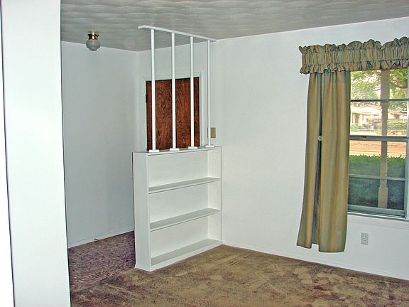 Interior view of Front Entry and Living Room Window