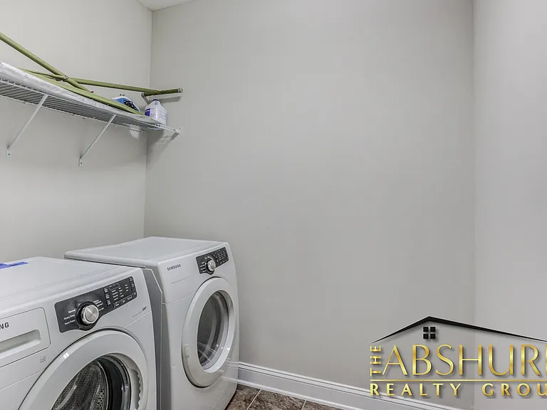 Laundry room with front load premium washer and dryer