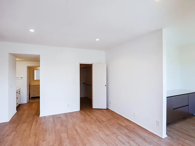 master bedroom, walk-in closet, 2 pedestal sinks, office nook and office cabinets