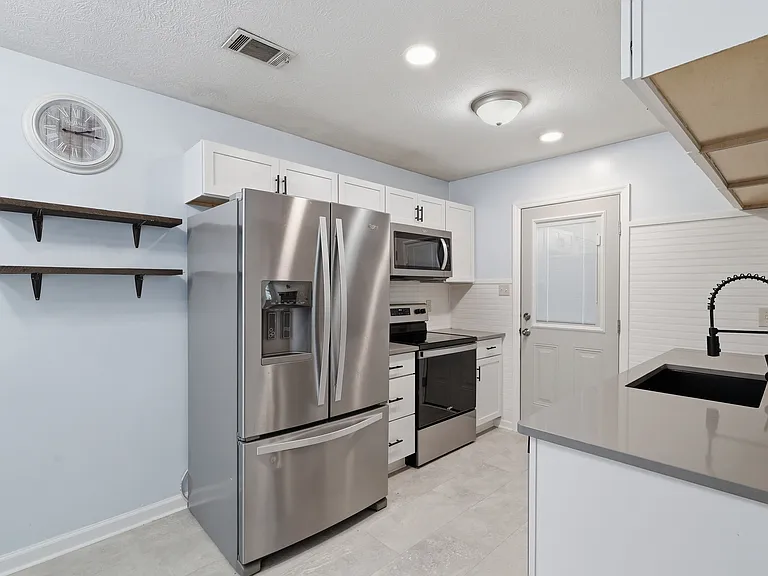 7668 NW Chatham Cir — Photo 14