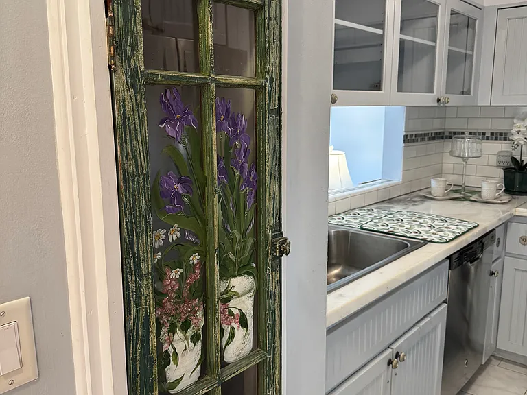 Glass door (on left) to electric panel.