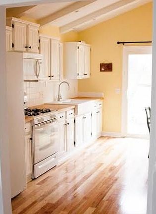 New Beautiful Gleaming Hardwood floors throughout!