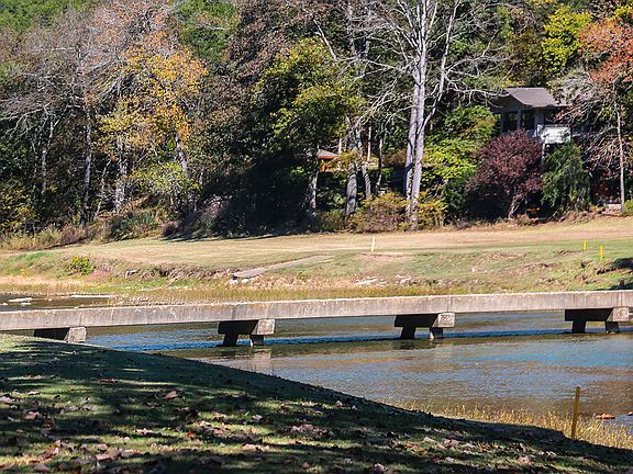 across bridge to golf course