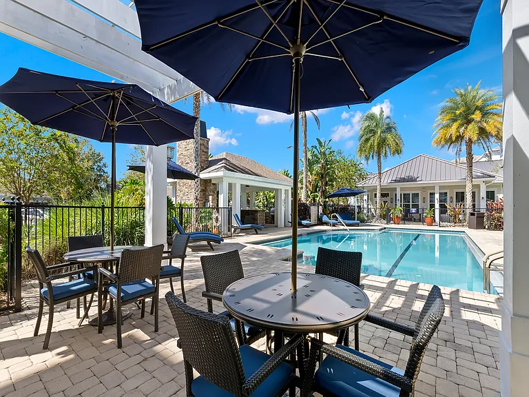 Swimming pool view with sitting area
