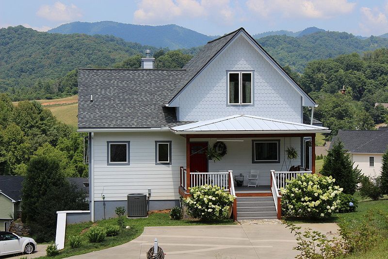 Front Entrance. Parking. Faces East.