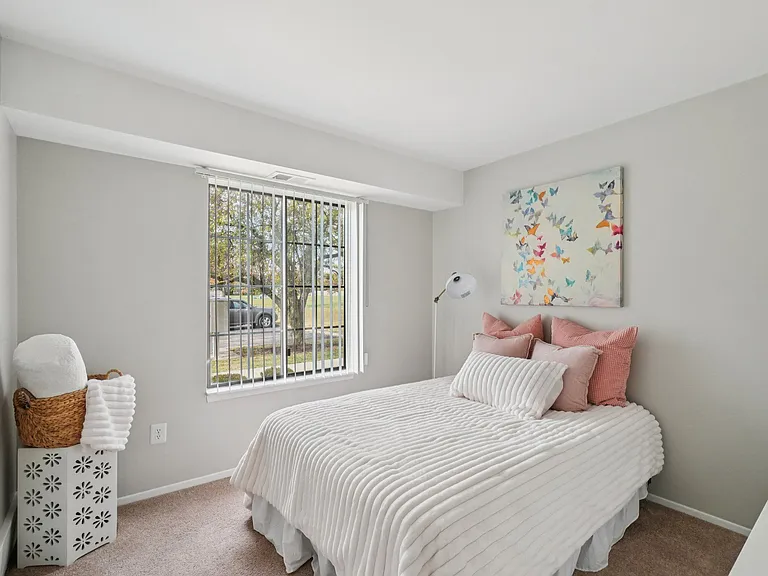 Enjoy peaceful bedrooms with abundant natural light from large windows, professionally operated by Highlands Vista Group.