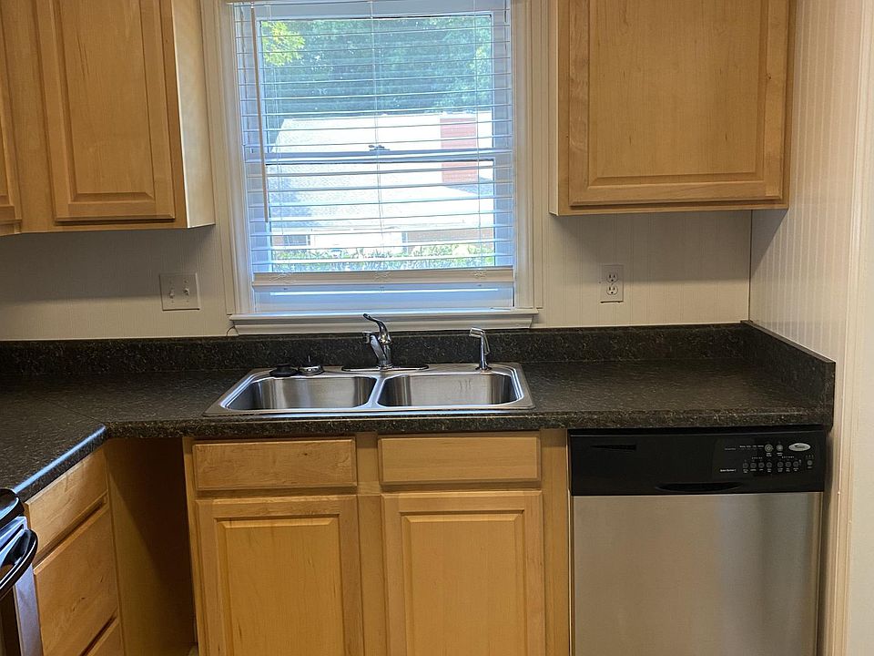 Kitchen with ample cabinet space and more space for shelves if desired. There is also a closet for a pantry off the kitchen.