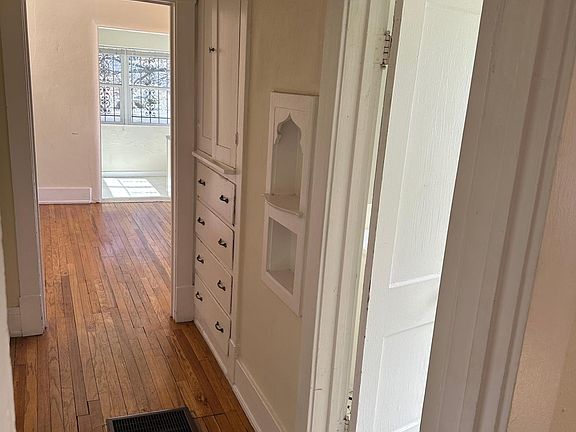 Hallway with great built-in storage.