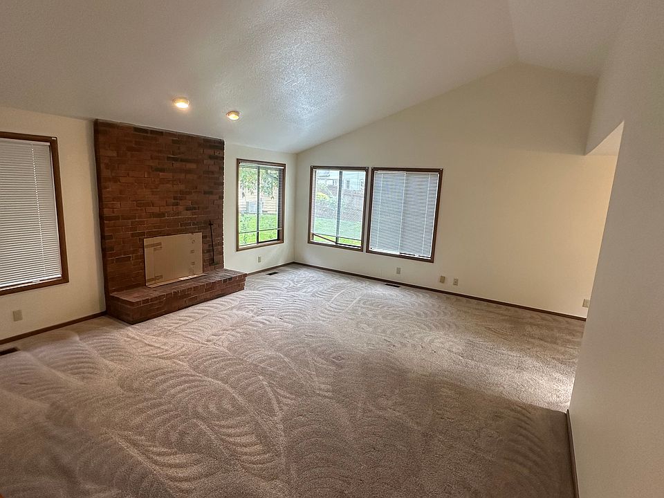 Living room with wood fire pit.