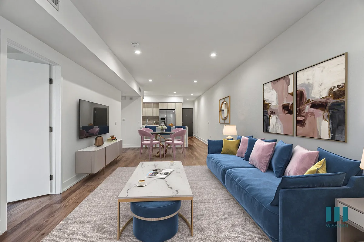 Open-Concept Kitchen, Dining, and Living Room Space - Kings on Third by Wiseman
