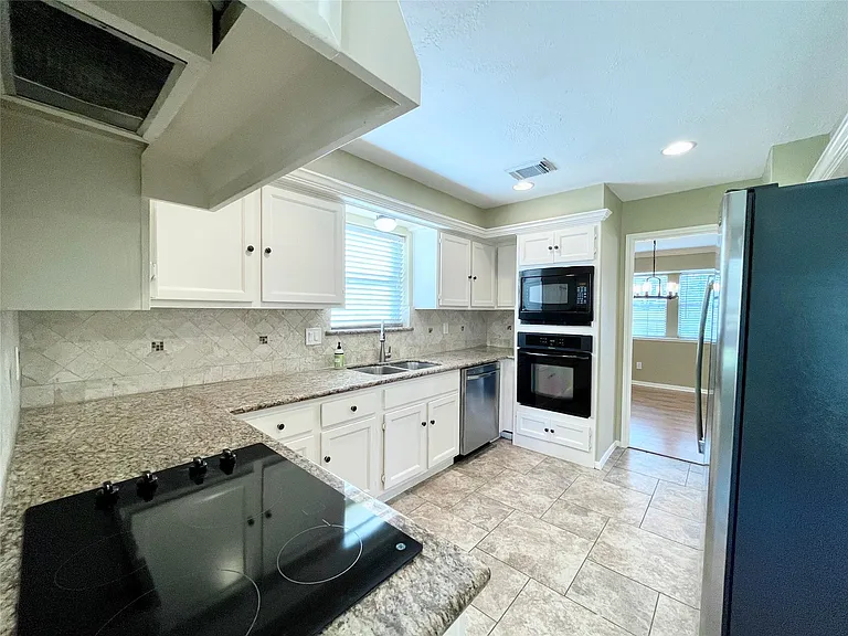 15006 Elmont Dr — Photo 25