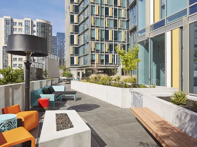 Outdoor chill lounge with common area seating and fireplace