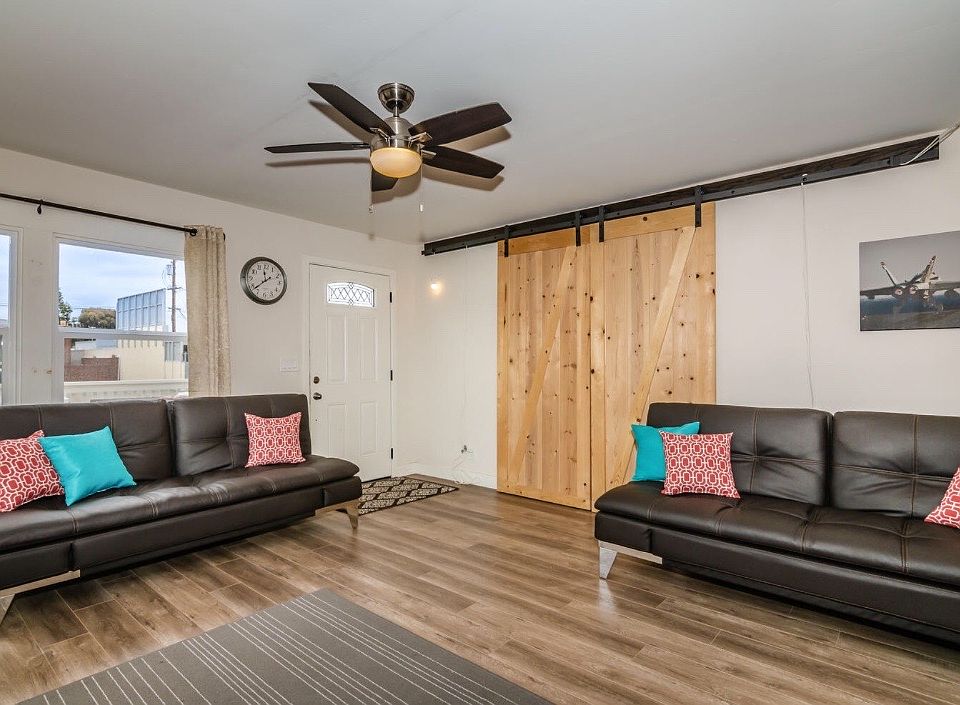Living room & closed doors to dining room