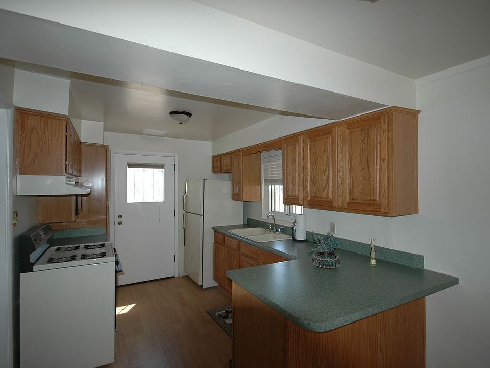 UPDATED KITCHEN, CABINETS, COUNTER TOPS AND APPLIANCE REFRIGERATOR INCLUDED