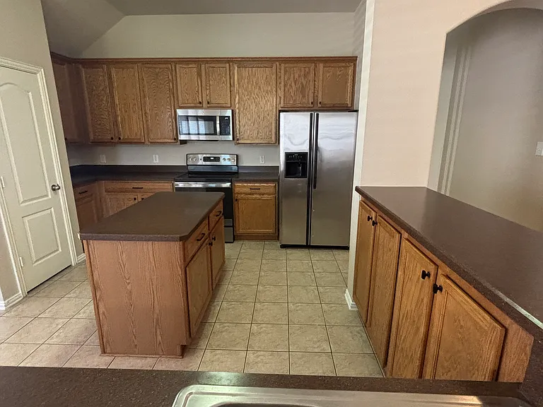 Standing at Bar top looking into Kitchen