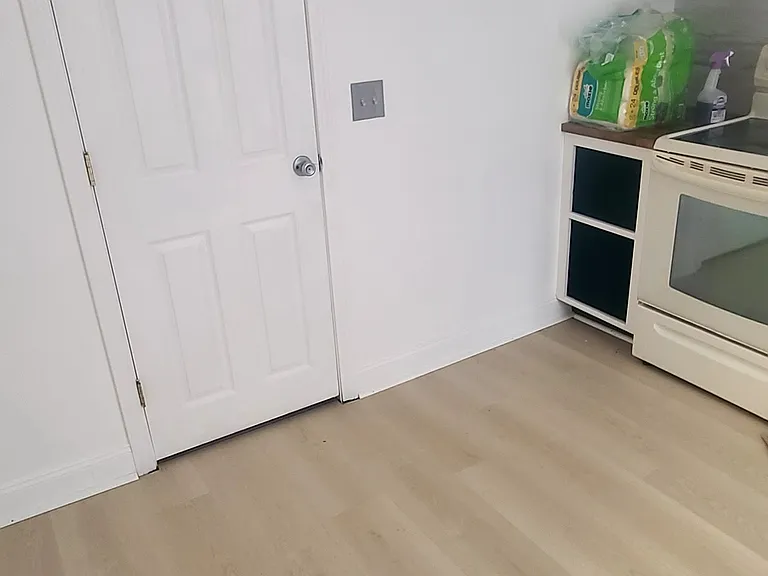 kitchen with entrance to bathroom