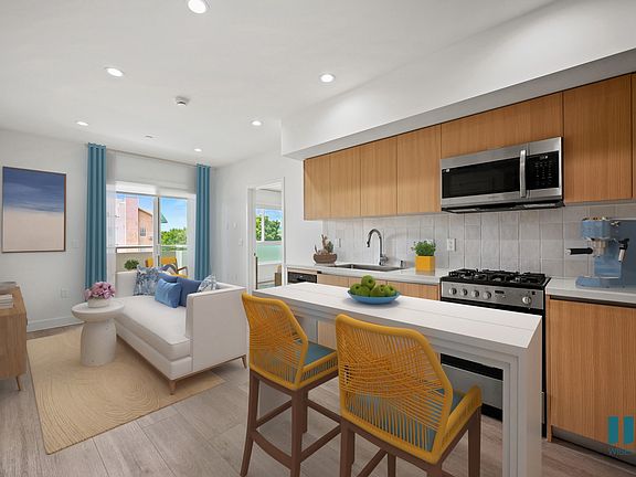 Open-Concept Kitchen, Dining, adn Living Room Space with Patio - Admiral Floor Plan