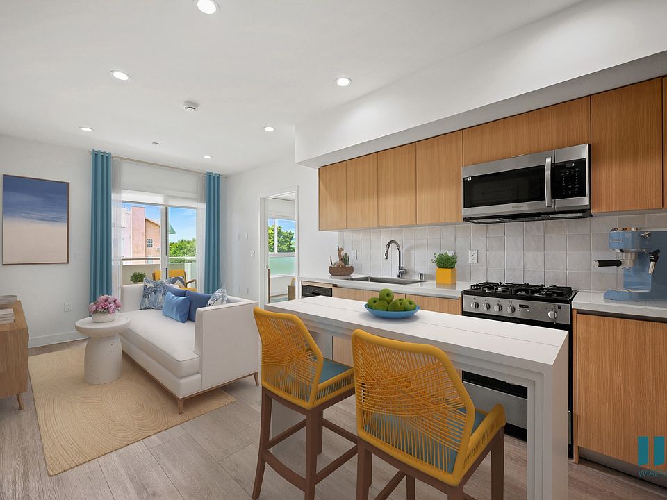 Open-Concept Kitchen, Dining, adn Living Room Space with Patio - Admiral Floor Plan
