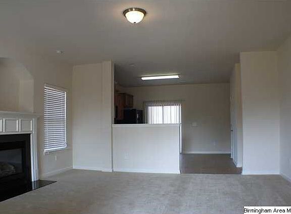 Kitchen with lots of cabinets  and new appliances