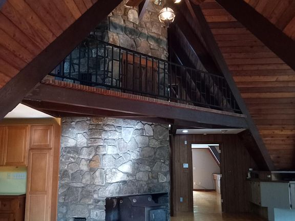 Wood stove and vaulted ceiling