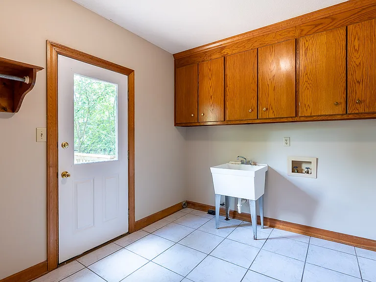 Large Laundry Room with Utility Sink