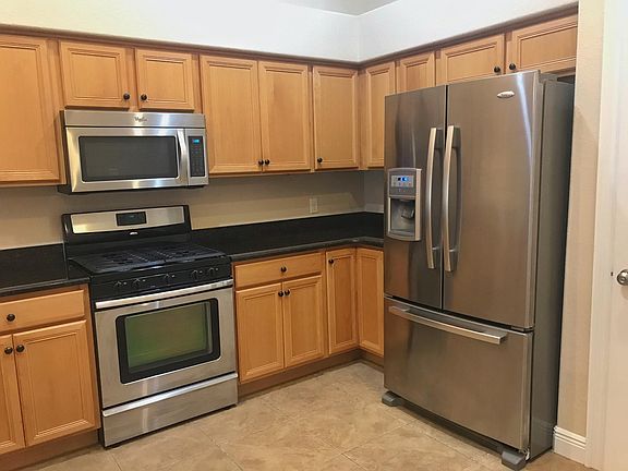 Kitchen with all stainless steel applicanes