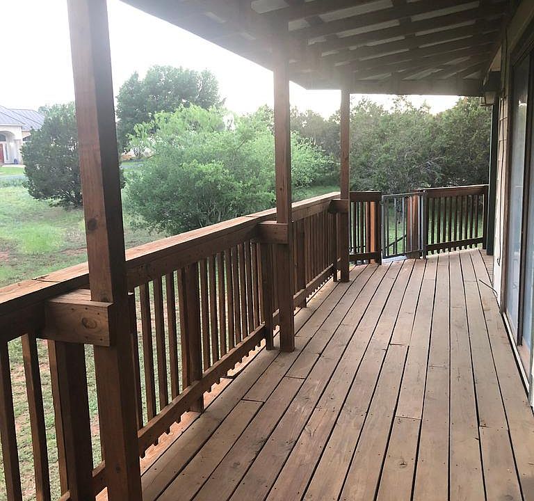 Outside deck with covered roof.