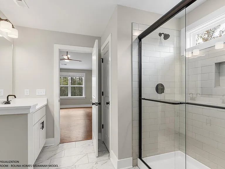 PRIMARY BATHROOM PICTURE FROM A DIFFERENT SAVANNAH MODEL RECENTLY BUILT BY ROLINA HOMES