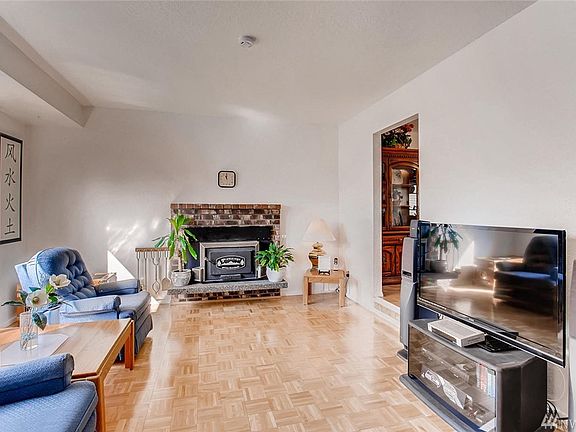 Have a seat and relax in the sunken living room off the main entrance. 