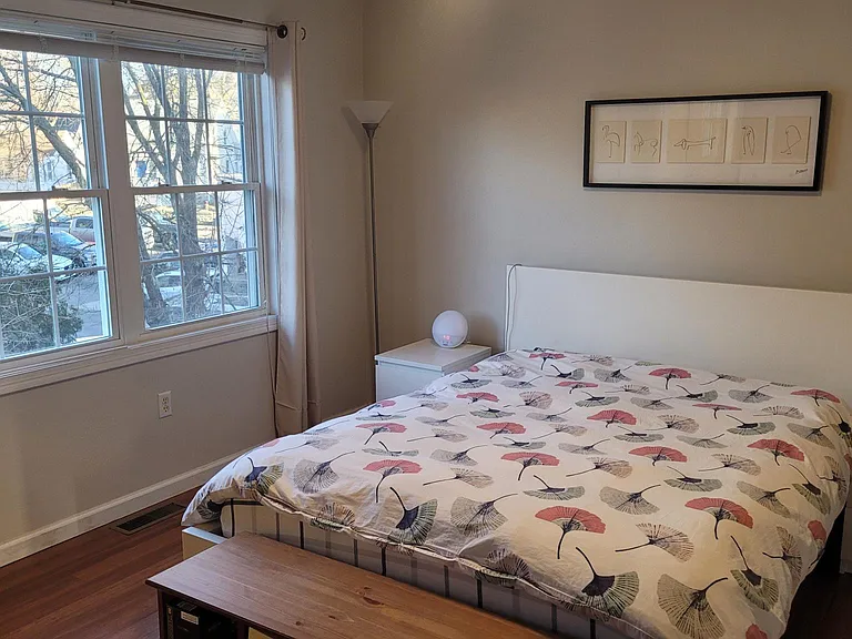 Lovely sun filled master bedroom