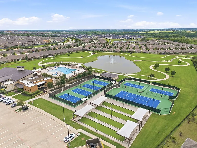 Game on! Pickleball, bocee ball then walk around the community pond.
