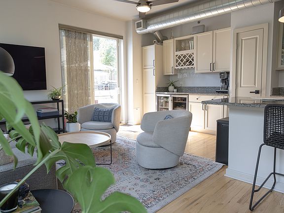 Wet bar conveniently located to living room and patio