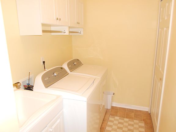Laundry with overhead and sink cabinet