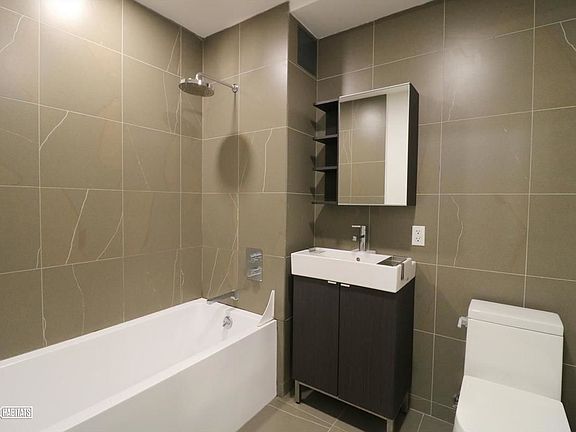 5th image of 316 E 3rd St APT 5C