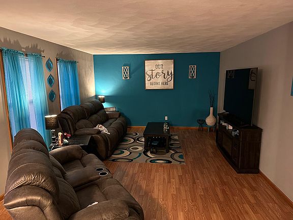 1st floor living room. View from kitchen.