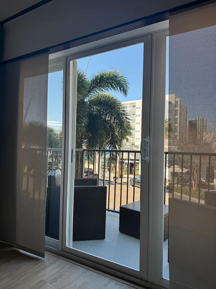 Spacious living room with a private balcony overlooking Central Avenue, nestled in the heart of the Edge District. - 1010 Central Ave #104
