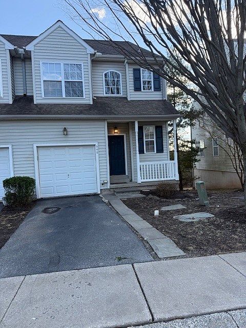 Front with garage and porch